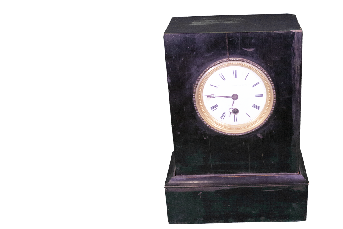 A clock made in France. Purchased at auction on St. Helena in 1821 by a British officer, given to Rev. W. J. Cother, brought to US in 1885, purchased from Cother in Belton in 1894 by J. M. Carroll, sold to G. W. Carroll of Beaumont, who gave it to Baylor, circa 1900.
